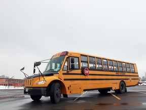 A empty school bus sits in a parking lot in Ottawa, Ont. Friday Jan 11, 2013. Students were allowed to attend school Friday but teachers refused to teach them.  Tony Caldwell/Ottawa Sun/QMI Agency