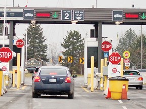 Cars check in at Cornwall's customs booths at the foot of the international bridge.
File photo/CHERYL BRINK