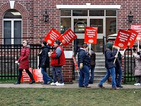 Kara Wilson, for The Expositor

Public elementary teachers picket in front of Brant MPP Dave Levac's office at 96 Nelson Street after school on Friday afternoon.