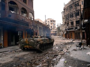 A military vehicle belonging to Syrian army loyal to President Bashar al-Assad is seen in Khan al-Wazir district near the castle of  Aleppo January 12, 2013.  REUTERS/George Ourfalian