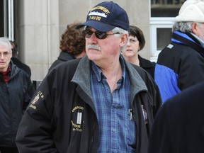 Ian Thomson, of Port Colborne makes his way out of the Welland courthouse Wednesday morning. Thomson was facing gun charges. The Crown withdrew careless use of a firearm and pointing of a firearm charges against Thomson, who still faces careless storage of firearms charges. DAVE JOHNSON QMI Agency