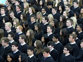 Members of Queen's University's graduating Class of 2012 attend a convocation ceremony last spring. The size of the class, as well as the presence of young women, stand in marked difference to the first group of students at 'Queen's College at Kingston' – 15 young men in training to be Presbyterian ministers who began studies in 1842.