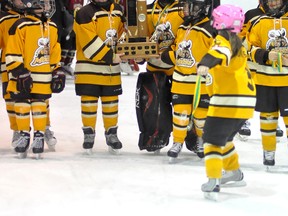 The Mattice Mighty Moose edged the Dubreuilville Bobcats 5-4 in the Panels and Pipes Winter Classic Atom 'A' final on Sunday at the Archie Dillon Sportsplex. The Mighty Moose skate around the ice with the trophy.