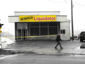 Laura Stricker photo. A fire early Saturday morning at Surplus Liquidator on Elm Street caused between $300,000 and $500,000 in damage.