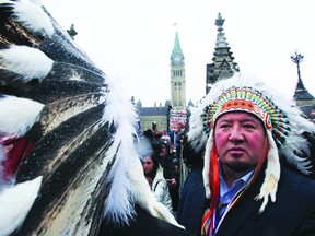 Derek Nepinak, grand chief of the Assembly of Manitoba Chiefs  and other chiefs are seen during a rally around Parliament Hill Jan. 11 in Ottawa.  As many as 3,000 demonstrators marched on Parliament Hill in protest to bill C45 which infringes on treaty rights and environmental protection laws. Nepinak did not meet with the Prime Minister.