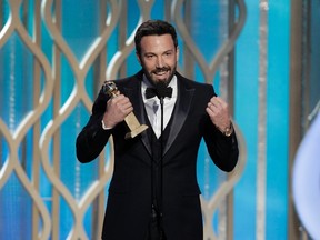 Ben Affleck accepts the award for Best Director - Motion Picture for "Argo" on stage on at the Golden Globe Awards in Beverly Hills, California January 13, 2013, in this picture provided by NBC. REUTERS/Paul Drinkwater/NBC/Handout