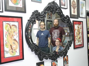 Sugar Shack Tattoo will move to the birthplace of the Kincardine Scottish Pipe Band this April, having taken possession of a part of the Pemberton Block on Jan. 10. The new shop will feature a larger waiting area and gallery to showcase the growing collection of designs and awards. Above, employees Jarrko Holopainen and Laura Parisotto are joined by owner and tattooist Scott Duncan, right, in their current location.