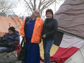 Treaty 3 Women’s Council members Jo-Anne Petiquan-Moore and Diane Kelly on Victoria Island where Attiwapiskat First Nation Chief Theresa Spence staged a hunger strike for a month, leading into Friday’s meetings between Prime Minister Stephen Harper and a delegation from the Assembly of First Nations.  
HANDOUT PHOTO