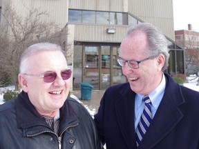 Dr. Gene Turgeon and Grant Walsh, president and CEO of the Group Health Centre, stand outside 170 East St.