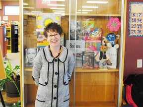 Leann MacKinnon, library assistant at the Whitecourt library, shows off some of the library’s 60’s memoriablia that is on display until Flash Back to the 60’s night. 
Barry Kerton | Whitecourt Star