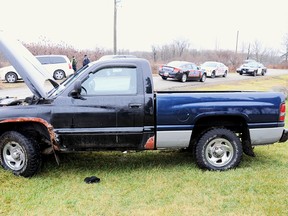 Chatham-Kent police released this photograph of a vehicle they believe used during armed robberies on Sunday, January 13, 2013. The pickup truck was found in the Moraviantown area after the third holdup of a Mac's convenience store in Ridgetown.  (Contributed photo)