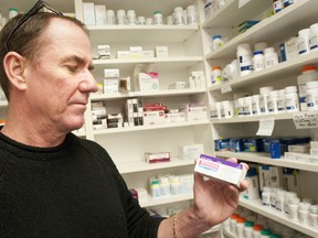 Pharmacist Jeff Robb of Turner Drug Store is frustrated by drug shortages that leave his shelves empty and compromise patient care. (CRAIG GLOVER, The London Free Press)