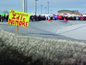 Idle No More protesters surround Cornwall's traffic circle after marching across the bridge back on Jan. 5.
Cheryl Brink staff photo