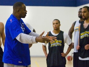Lightning coach Micheal Ray Richardson has a few words with his players after a London Lightning practice. (QMI Agency file photo)