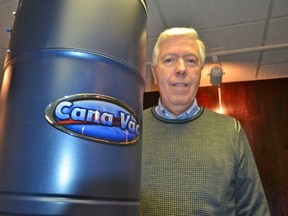 Canavac Systems Inc. president David Lawrence with one of the company’s central vacuum cleaner units. The company is moving to a much larger plant in Stratford.