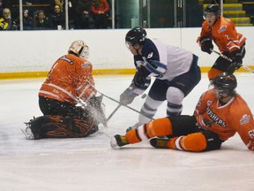 The Plex was packed on Friday for the Saugeen Shores Winterhawks game against the Shallow Lake Crushers. Coming out strong and out shooting the Crushers 36 - 23, the ‘Hawks couldn’t capitalize on their scoring chances losing 3-2 to Shallow Lake. Pictured above is Winterhawk’s Bryan Kazarian going in for a rebound, slapping at the puck in hopes that it will trickle past Shallow Lake’s goaltender Trevor Van Wyck for a goal.