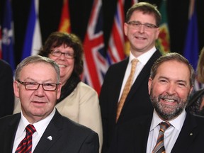 Federal NDP Leader Thomas Mulcair is seen with Nova Scotia Premier Darrell Dexter and BC NDP leader Adrian Dix during a NDP Leaders Summit  in Ottawa, January 15, 2013.  Andre Forget/QMI Agency