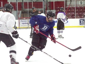 Members of Beaver Brae’s boys hockey club work out at the Kenora Recreation Centre Tuesday, Jan. 8. The team has been out of competitive commission since job action taken by Ontario’s public high school teachers saw the NorWOSSA schedule wiped out in mid-December. 
GARETT WILLIAMS/Daily Miner and News