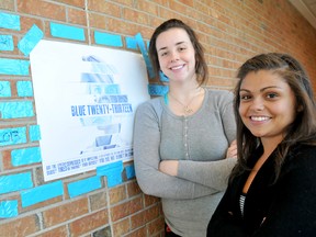 Heather McCann, director of marketing, St. Clair College Thames Campus Inc., left, and Alexandra Fraser, president, are helping students make blue beautiful by highlighting mental illness with a Canada-wide campus march called #Blue2013 on Jan. 21. (DIANA MARTIN, The Chatham Daily News)