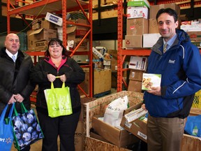 Kevin Simpson, Noral Toyota general manager, Arianna Johnson, Wood Buffalo Food Bank executive director, and Fahd Najmeddine, Noral Toyota service manager, met earlier this month when Simpson and Najmeddine brought more than 230 kg of non-perishable donations to the food bank as part of a national Toyota campaign. AMANDA RICHARDSON/TODAY STAFF