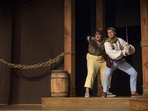 Raymond Moreau plays Dromio of Syracuse, and Ian Coppin is Antipholus of Syracuse in a scene from the Fanshawe College theatre arts program?s production of William Shakespeare?s Comedy of Errors. (Agata Lesnik, Fanshawe College staff photographer)