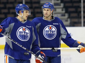 Oilers Shawn Horcoff and Ryan Smyth talk during their training camp at Rexall Place in Edmonton, Alberta on Monday January 14, 2013 PERRY NELSON - EDMONTON SUN / QMI AGENCY