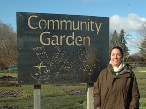 St. Thomas Community Gardens committee chairwoman Brigitte Cosens at the First Ave. and Elm. St. community garden. The commitee is seeking suggestions for another community garden which, with enough support, will be open this summer. Nick Lypaczewski Times-Journal