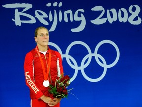 Celebrated Canadian diver Emilie Heymans, who won four Olympic medals in her career, retired Wednesday. (QMI Agency file photo)