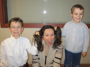 From left, Cole, Michelle and Jake Irvine are prepared to lose their locks to raise money for kids suffering from cancer. If the family raises $10,000 Michelle will have her head shaved.