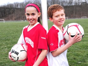 Amber Safadi (U11 girls), a student at John Wise Public School, and Clark Renaud (U10 boys), who goes to Pierre Elliott Trudeau French Immersion School are looking forward to the coming St. Thomas Soccer Club season. (R. MARK BUTERWICK, St. Thomas Times-Journal)