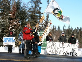 Members of Iskatewizaagegan (Shoal Lake 39) and Shoal Lake 40 First Nations joined to blockade the TransCanada Highway on Wednesday afternoon, Jan. 16, 2013.  
JON THOMPSON/Daily Miner and News