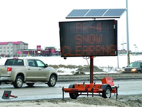A traffic sign on Baseline Road warns drivers of a parking ban that will take effect Thursday, Jan. 15 when the county launches a P4 clearing. Leah German News Staff