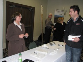 Jennifer Dorval, of Dumas Contracting, chats with Richard Lapointe of Rock Solid Parts, during the Meet the Purchasers event held at the Days Inn in Timmins Tuesday. The annual event, hosted by the Timmins Chamber of Commerce, provides a networking opportunity for large local corporations and potential suppliers.