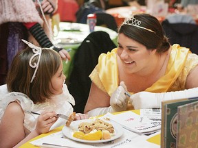 Expositor file photo

Kennedy Clark meets Belle (Maxine Smitiuch) as she enjoys her breakfast at last year's annual Kids Can Fly Storybook Breakfast held at the Rossini Lodge.