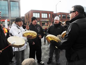 Laura Stricker photo. Idle No More supporters in a drumming circle outside Rainbow Centre in downtown Sudbury on Jan. 16, 2013.