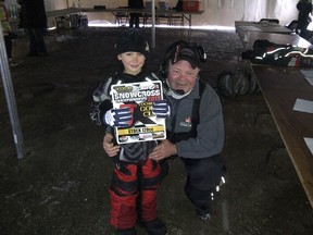 Evan Girard, 7, received third place in his first ever snowmobile race during the 120 Stock competition at the Cochrane Gold Cup Snowcross on Jan. 12.