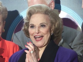 Pauline Phillips, also known as the advice columnist Dear Abby, applauds after her star on the Hollywood Walk of Fame is unveiled in Hollywood, California in this Feb. 14, 2001 file photo. (REUTERS/Fred Prouser/Files)