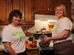 Cheryl Muir, left, and Deb Vandewiel of Springtime in Paris are ready to cook up some chili to compete in the third annual Paris Optimist Chili Cook-off on Saturday, Jan. 26, 2013. The money raised goes to construct the second phase of the Paris Optimist Skate Park. MICHAEL PEELING/THE PARIS STAR/QMI AGENCY