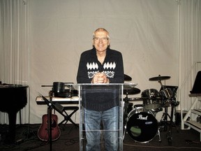 Former River of Hope head pastor Larry Froese gets behind the podium one last time. Froese retired in December after serving 25 years at the church.