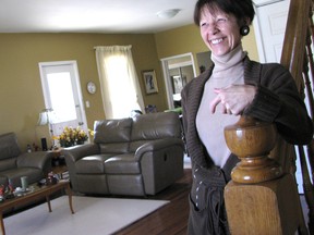 Karen Maxwell in the Thamesville home she and her husband Bill spent over two years renovating. The Victorian-era house was nominated for a Mayor's Heritage Preservation Award. The home's interior was gutted beginning in 2010; all that remains that was original is the bannister to the staircase that leads to the second floor. (Peter Epp, QMI Agency)