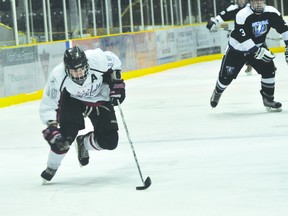 Central Plains Capitals forward Devin Muir skates with the puck during a game against the Interlake Lightning. (Kevin Hirschfield/QMI AGENCY)