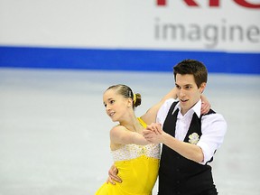 Eric Thiessen and Kendra Digness perform their short program at the Canadian Tire National Figure Skating Championships in Mississauga, Ont. on Monday. Thiessen and Digness finished fourth overall in novice pairs. The two have been skating together for less than a year. (©Skate Canada/Stephan Potopnyk.)