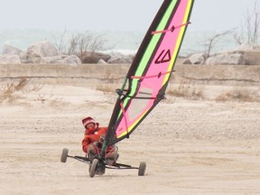 A land sailor glides along the sand at Port Elgin's Main Beach Tuesday (Jan. 15) afternoon. This adventurer had the wind in his sails and any thoughts of winter blown away.