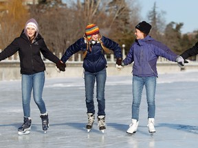 From left, Vermont students, Fin Brokaw, Juniper Nardiello Smith, Morgan Pratt and Keeley Cane skate on the Rideau Canal Skateway shortly after it opened for the first time this season Friday, Jan. 18, 2013. Darren Brown/Ottawa Sun/QMI Agency)