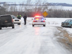 An 18-year-old man remains in custody following a pursuit that ended in the suspect crashing his vehicle then allegedly fleeing on foot early Friday, Jan. 28, 2013 morning just outside of Grande Prairie city limits on 132 Avenue. ADAM JACKSON/DAILY HERALD-TRIBUNE/QMI AGENCY