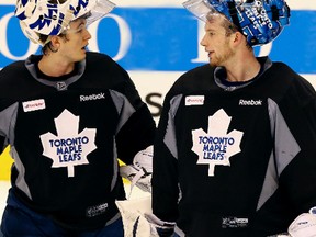 “Are you starting in Montreal tonight?” “I don’t know, do you?” One thing is certain: Either Ben Scrivens (left) or James Reimer will be in net when the Leafs open the season in Montreal. (Veronica Henri/Toronto Sun)