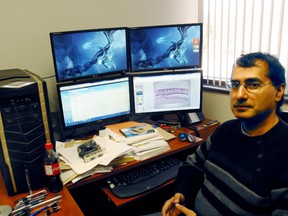 Reehan Mirza, an aquatic behaviour ecologist in Nipissing University's biology department,  shown in his office, Wednesday, Jan. 16, 2013, is studying how fish release chemical alarm cues to help their species avoid predators, and how lake pollutants could interfere with that instinct. (Maria Calabrese/The Nugget/QMI Agency)