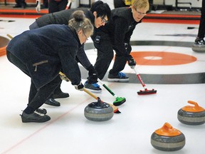 From left, Jeanie Collier, Brenda McDonald and Shirley Zuehlke sweep home a rock thrown by skip Beth Somerville Jan. 13. The rink was playing against the Susan Somerville rink from Nanton during a semi-final match. A total of 17 teams played in the annual Women's Diamond Spiel, which ran Jan. 11-13 at the Vulcan Curling Rink.

Simon Ducatel/Vulcan Advocate