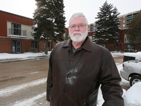 Rod Wyatt, Grey County’s director of housing, in front of an affordable housing unit in Owen Sound.
