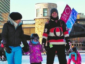 Ottawa Senators fan Ken Jennings braved the frigid Rideau Canal with his family on Sunday as temperatures plunged to an icy -12C, which felt like -21 with the wind chill. Jennings will be hunkered down at his place with wife Jessie and daughters Gabrielle, 6, and Sienna, 4 when the Sens play their home opener Monday night. (TONY SPEARS/Ottawa Sun/QMI Agency)